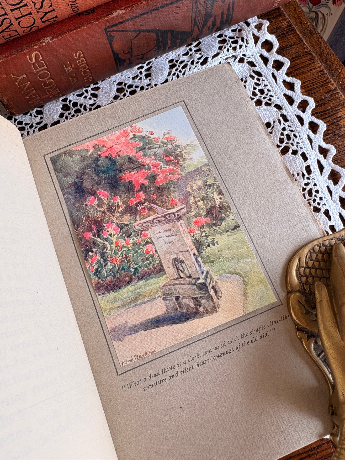 1914 The Book of Old Sundials & their Mottoes: With Eight Illustrations in Colour by Alfred Rawlings and Thirty-Six Drawings of Some Famous Sundials by Warrington Hogg. Cover designed by Jessie M. King.